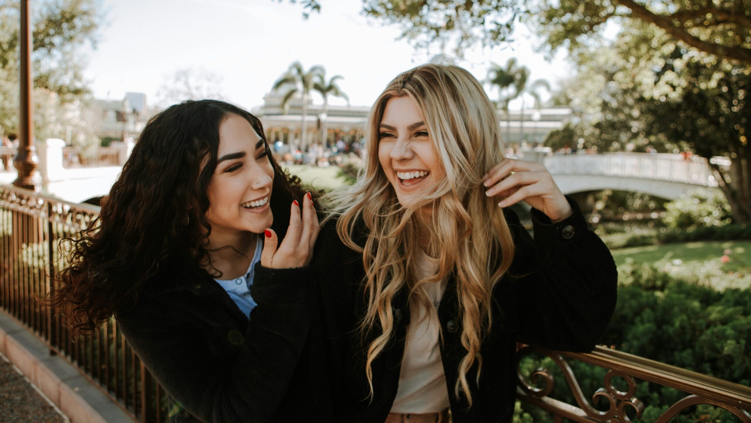 Women laughing together because of emotional intelligence